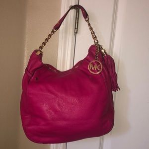 Authentic medium sized hot pink Michael Kors purse